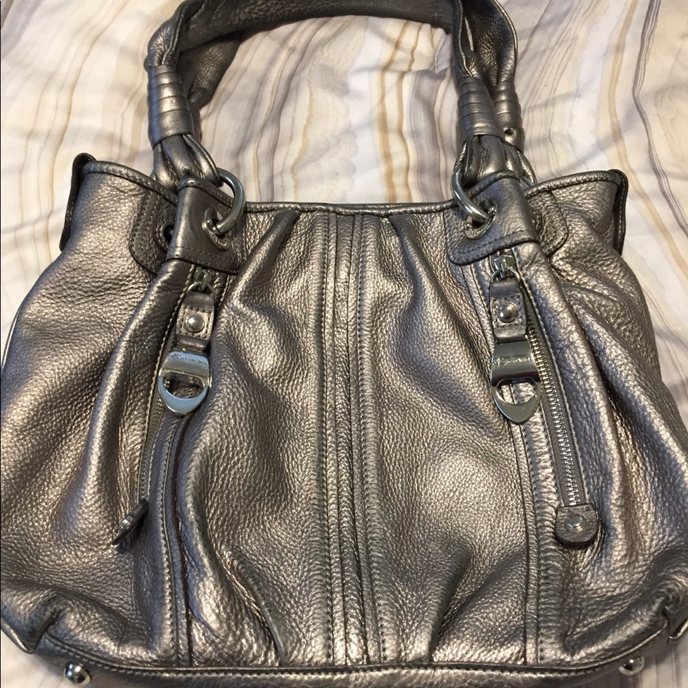 B.  Makowsky Silver Purse.